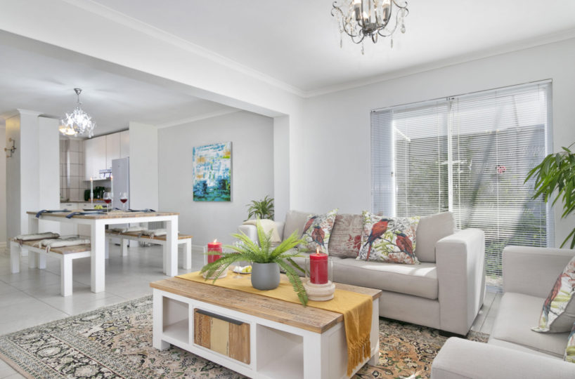 Lounge at 2 Bedroom Marina Da Gama Self Catering Accommodation In Muizenberg - Heron Cottage